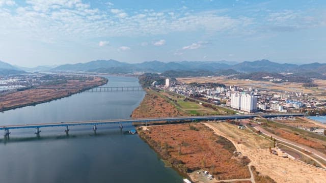 Serene river flowing through a cityscape