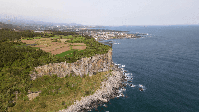 Scenery of coastal cliffs and farmland
