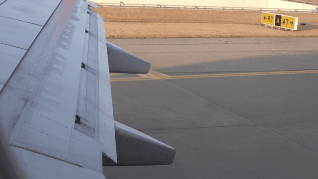 Airplane wing on the runway