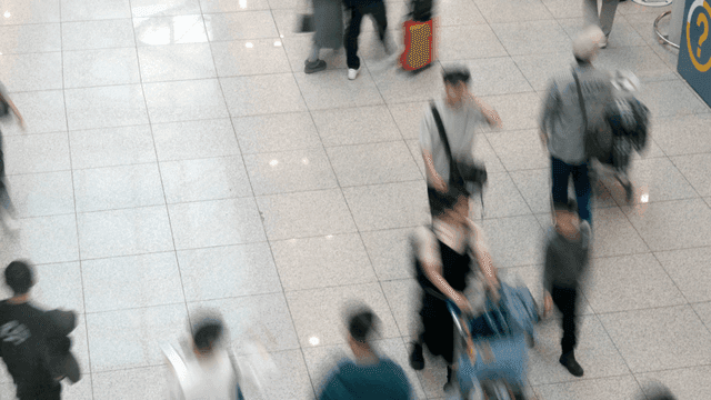 People walking in a busy terminal
