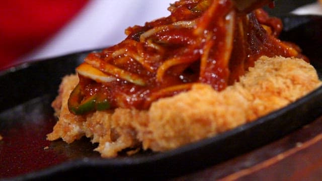 Crispy pork cutlet with spicy sauce