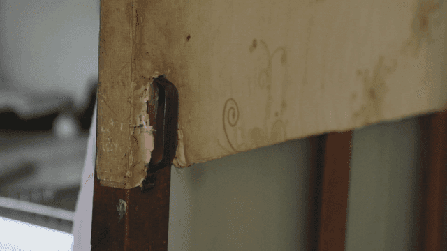 Old wooden furniture with marks of damage