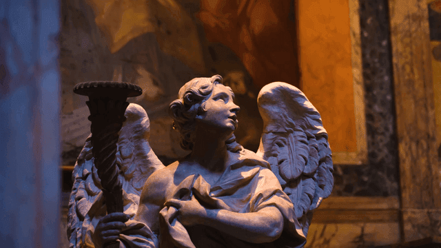 Intricate angel statues inside cathedral