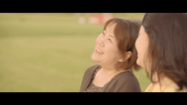 Two women enjoying a conversation outdoors