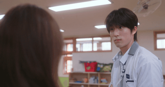 Students having a conversation in class