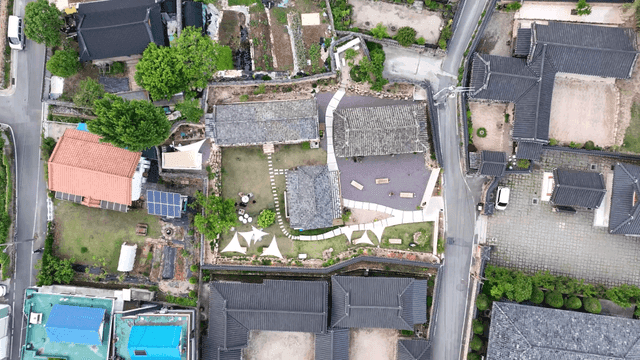 Village of traditional Korean houses with tiled roofs