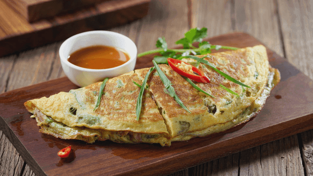 Omelette with herbs and dipping sauce