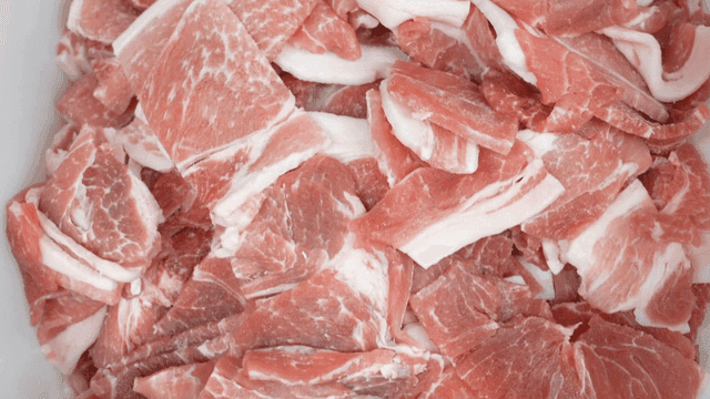 Freshly sliced pork in a bowl