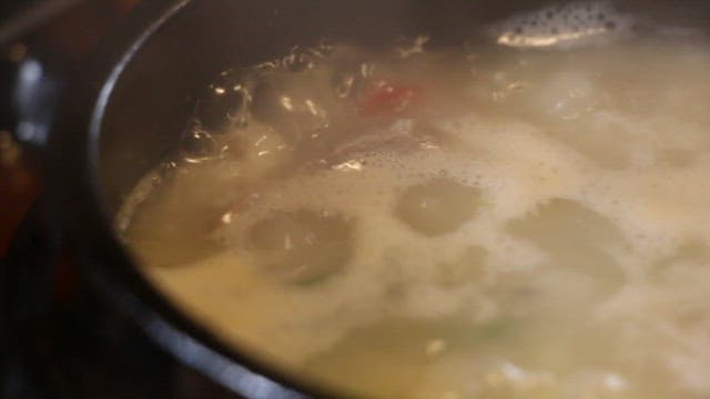 Samgyetang with chicken and vegetables boiling