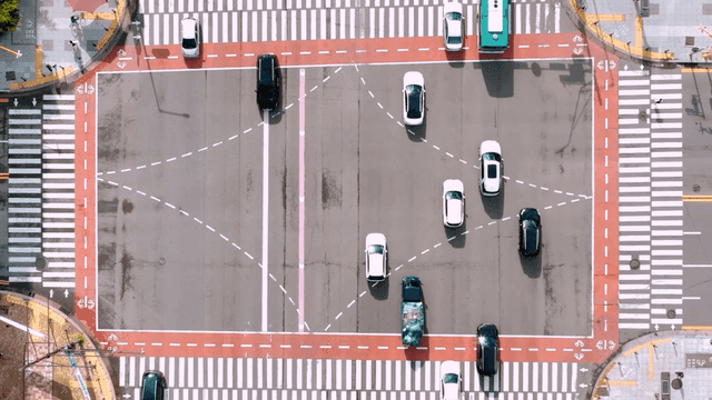 Busy intersection with moving vehicles