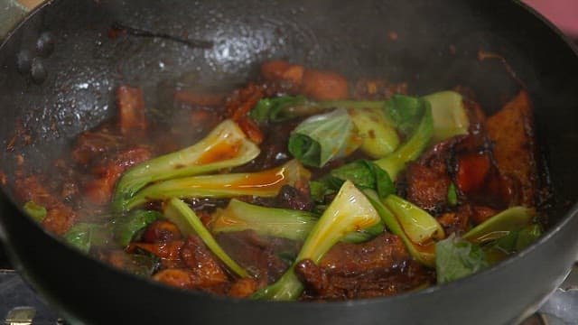 Stir-fried Bok Choy and Meat Cooked in a Pan