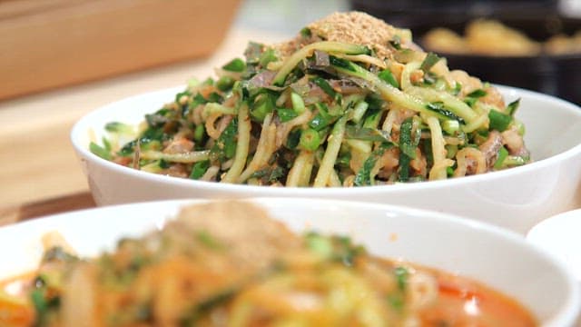 Fresh cold raw fish soup in a white bowl