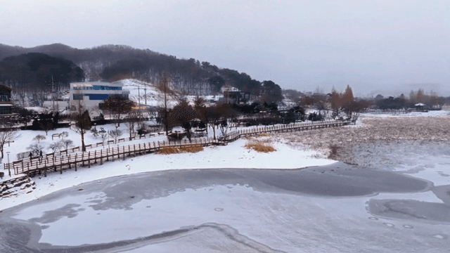 Snowy landscape with a frozen lake