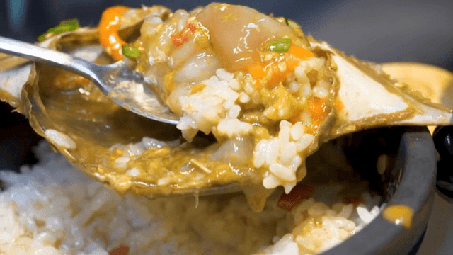 Soy Sauce Marinated Crabwith rice and sesame seeds