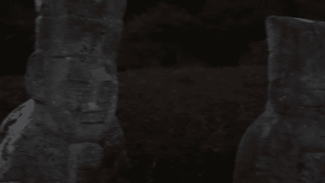 Traditional stone statue in a garden