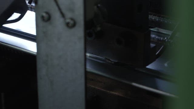 Metal being processed with sparks flying