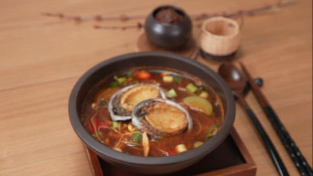 Bowl of hot and spicy abalone ttukbaegi stew