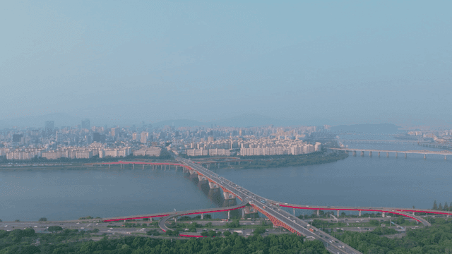 Seoul cityscape with bridge over the river