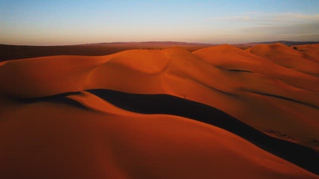 Serene Dusk over the Desert Dunes