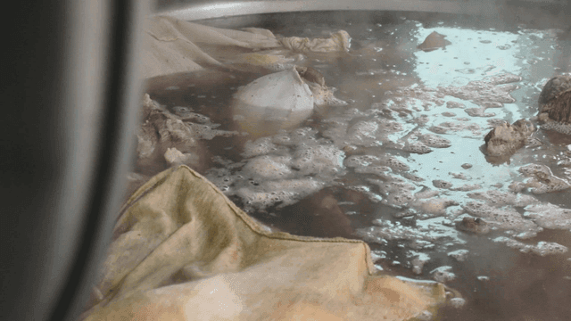 Ingredients boiling in a large pot