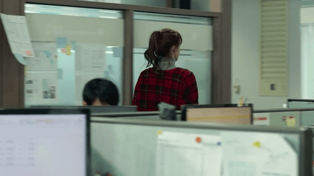Woman moving around the office