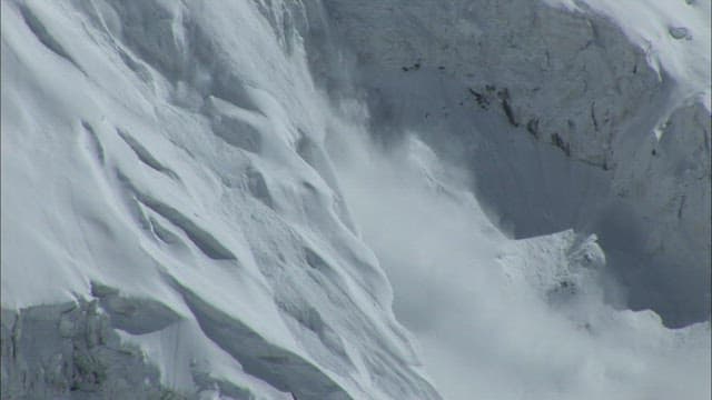 Dramatic Avalanche in Snow-covered Mountains