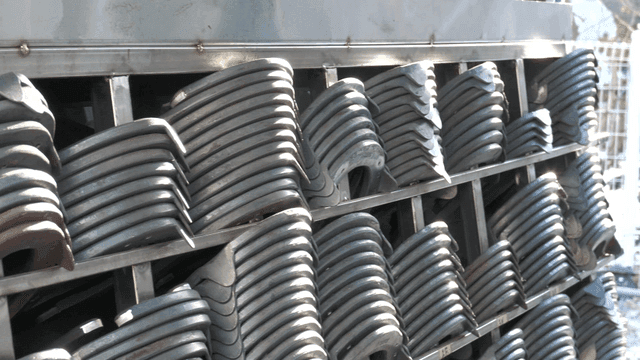 Stacked metal parts in an industrial setting