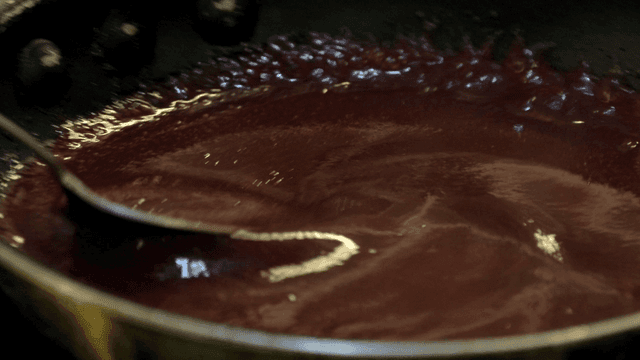 Ladle for stirring thick sauce in pan