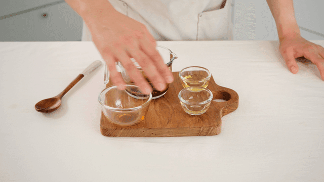 Chef mixing sauce ingredients