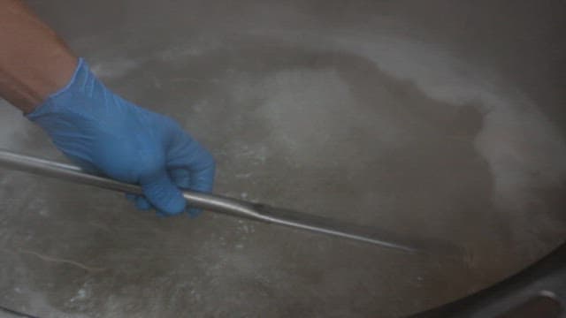 Buckwheat noodles cooked in a large industrial cooker