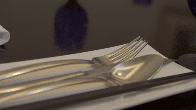 Cutlery set neatly arranged on a table