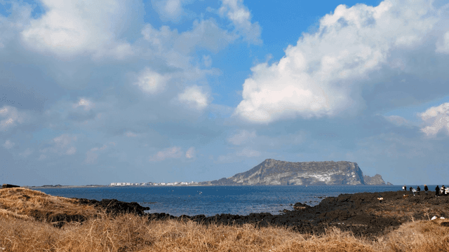 Coastal scenery with mountains in distance