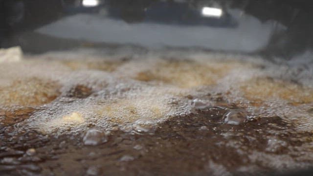 Pork batter fried in hot boiling oil