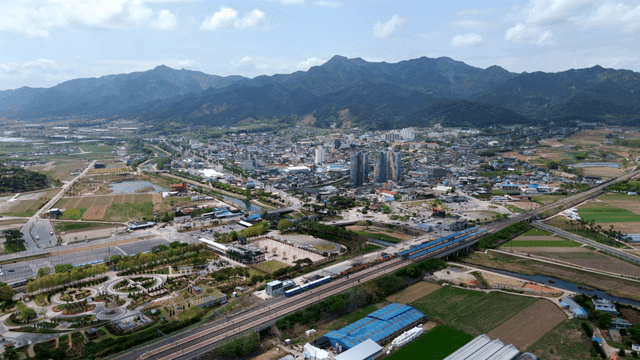 Aerial view of a rural town and farmland