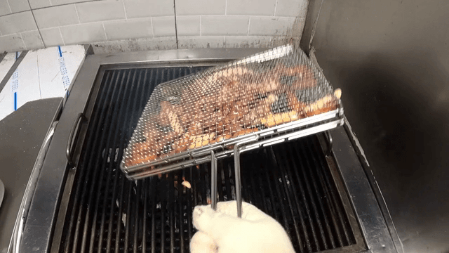 Grilling Korean pork belly on a barbecue
