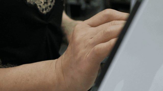 Person using a POS machine at a store
