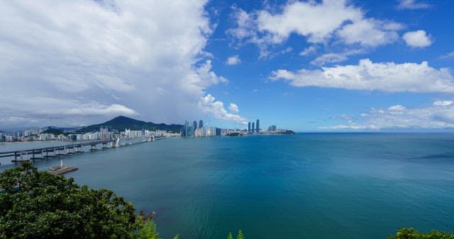 Clear day, coastal city Busan and calm sea scenery