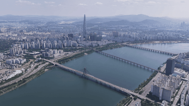 Aerial view of a city with rivers and bridges