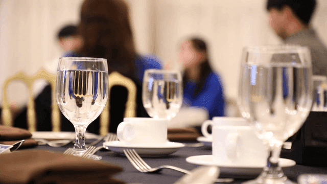 Elegant banquet setting with people