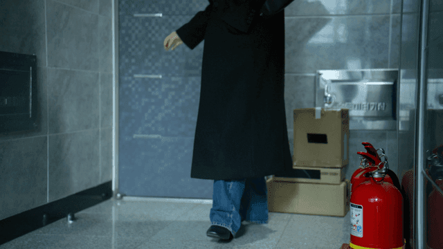 Woman opens door and leaves house