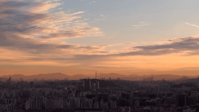 City skyline at sunset with colorful sky