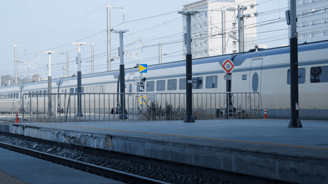 High-speed train passing through station