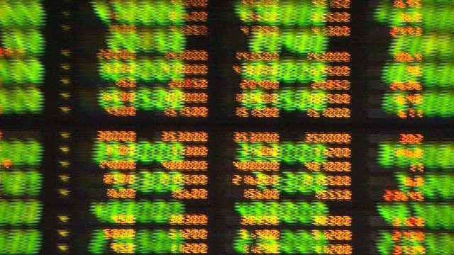 Stock Market Display in a Modern Exchange Interior