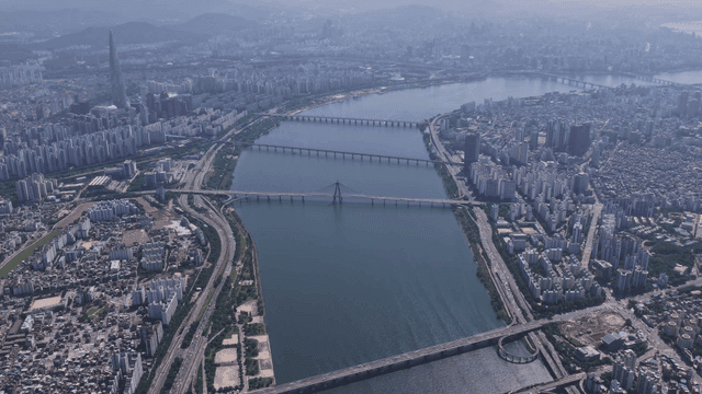 Aerial view of a city with a river