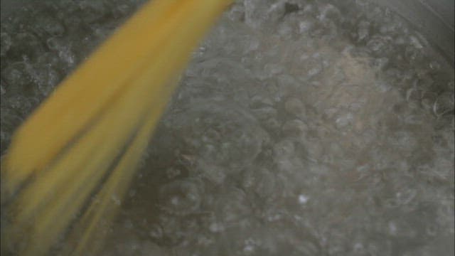 Boiling pasta in a pot of water