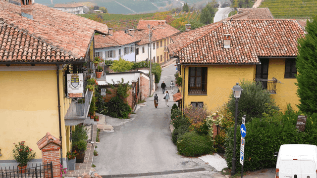 European village street with people walking