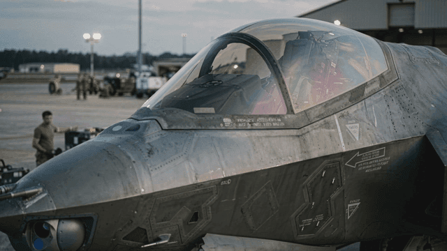 Military aircraft on an airbase at dusk