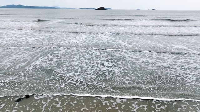 Serene beach with gentle waves