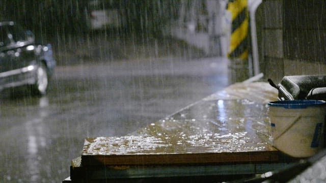 Alley scene with heavy rain