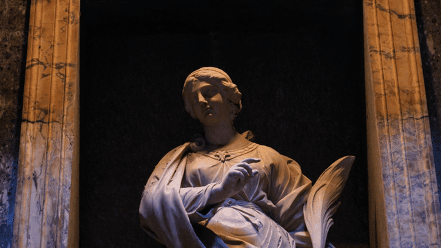 Cathedral sculptures in dimly lit niches